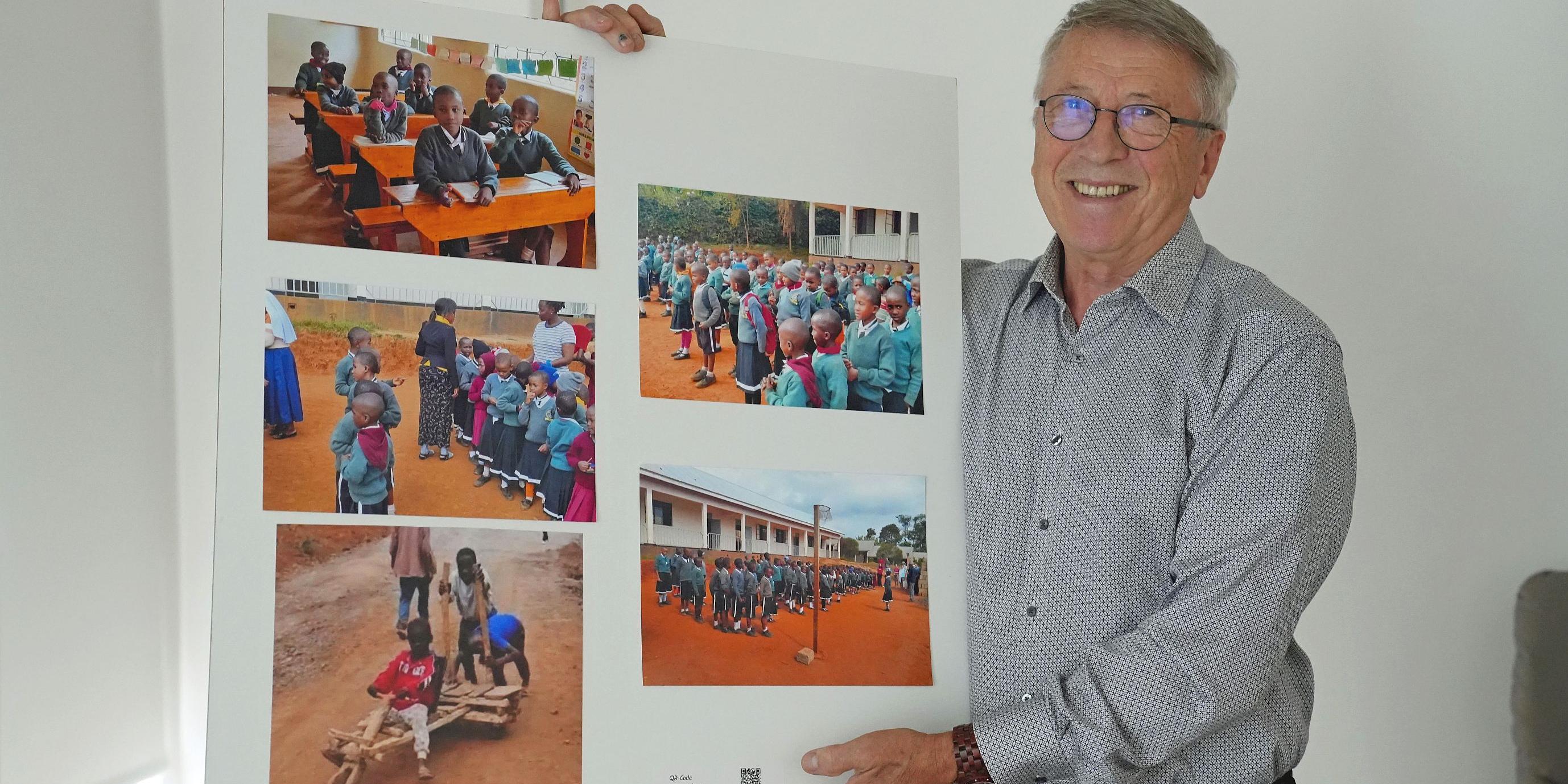 Eduard Kimmlingen zeigt ein Plakat mit Fotos der Projekte (c) Stefan Endres Eduard Kimmlingen zeigt ein Plakat mit Fotos der Projekte