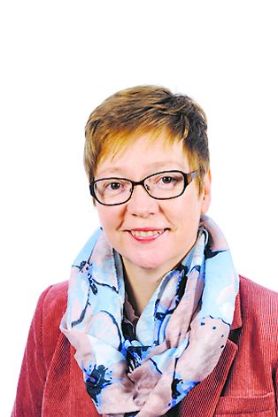 Portraitfoto von Dr. Carola Fleck.