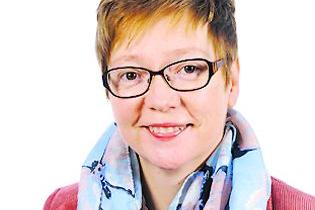 Portraitfoto von Dr. Carola Fleck.