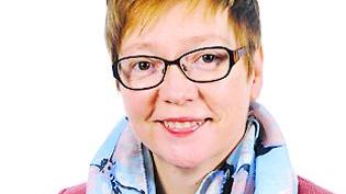 Portraitfoto von Dr. Carola Fleck.
