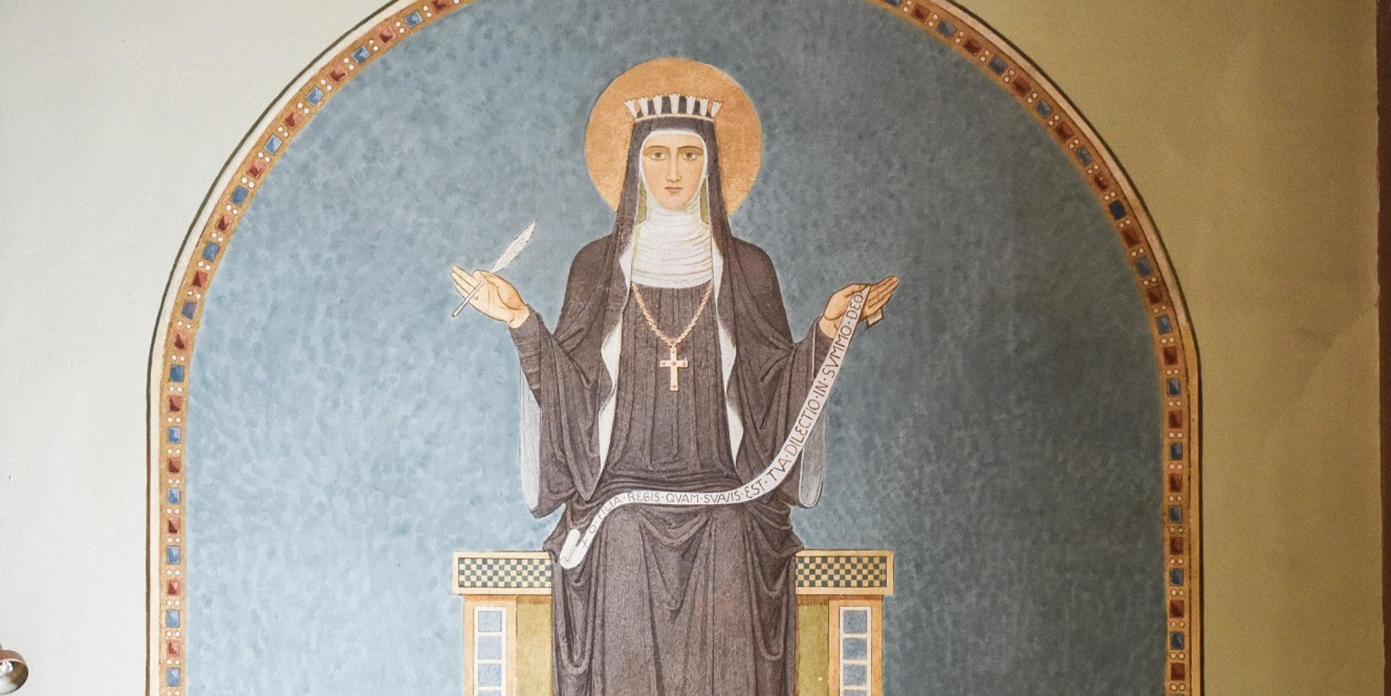 Ein Gemälde zeigt Hildegard von Bingen in der Abteikirche der Benediktinerinnenabtei Sankt Hildegard in Rüdesheim am Rhein.