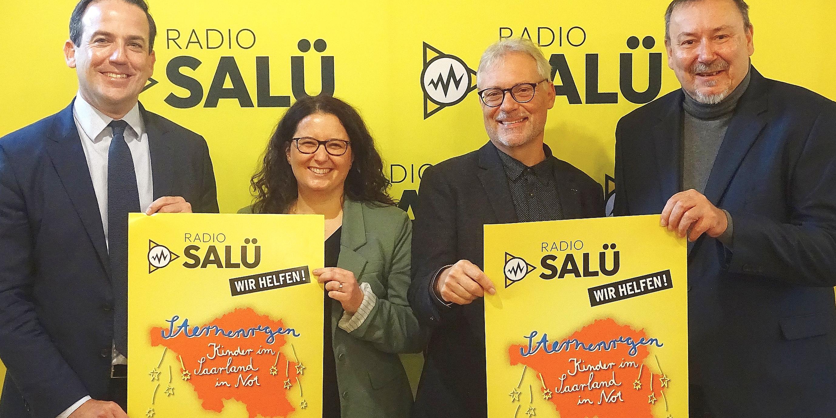 Bei der Vorstellung der neuen Aktion (von links): David Lindemann, Chef der Staatskanzlei, Sozialarbeiterin Tanja Klaus, Pfarrer Wolfgang Glitt und Axel Musolff, Geschäftsführer und Programmdirektor des Senders. (c) Radio Salü Bei der Vorstellung der neuen Aktion (von links): David Lindemann, Chef der Staatskanzlei, Sozialarbeiterin Tanja Klaus, Pfarrer Wolfgang Glitt und Axel Musolff, Geschäftsführer und Programmdirektor des Senders.